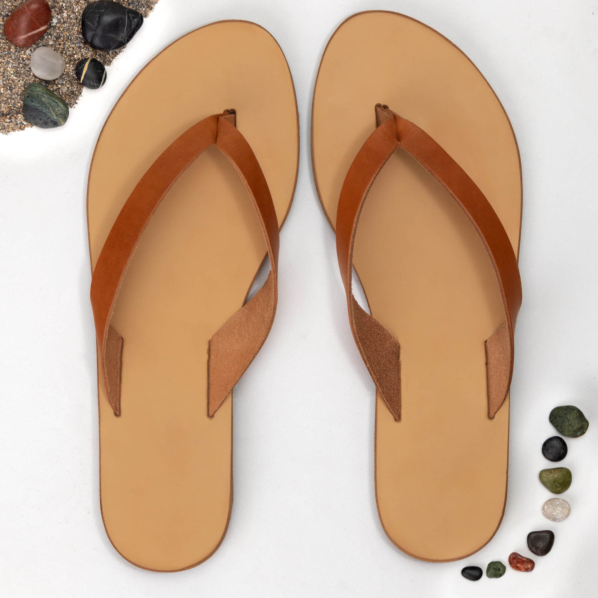 Gaia Natural Tan leather toe-post sandals on foot